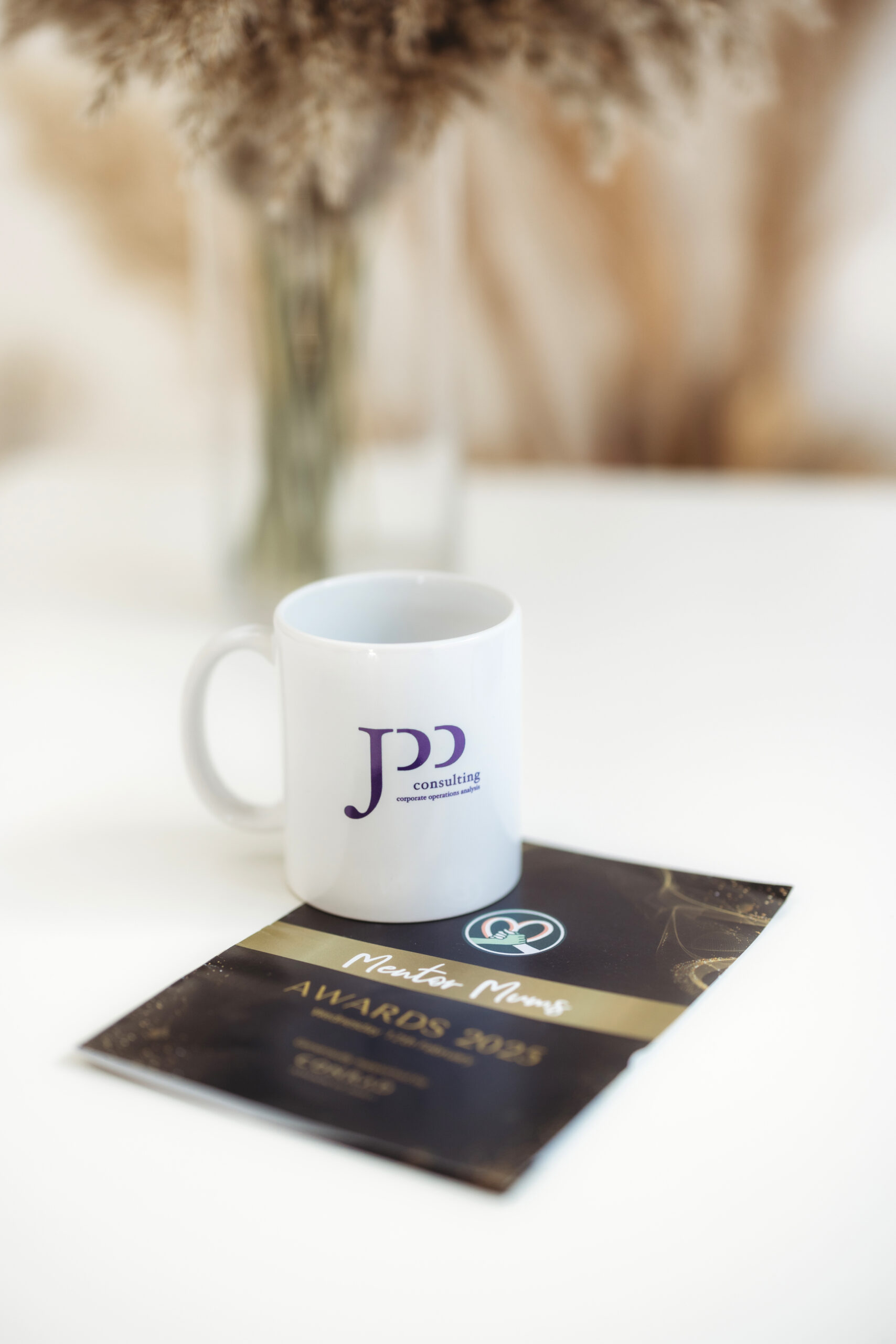 Luther can we keep this image without and defocus/ fuzz out the 'Mentor Mum ' just leave AWARDS 2025??